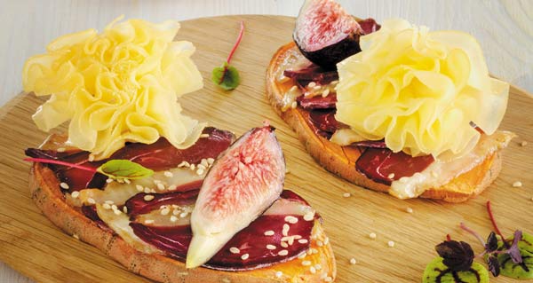 Sweet potato toast with duck breast, figs and Tête de Moine AOP